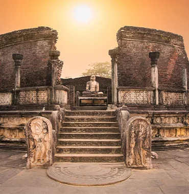 Stone steps and carved ruins at an ancient Sri Lankan temple, featured by Airwing Tours