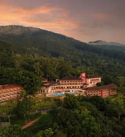 Amaya Hills hotel buildings on a forested hillside in Kandy.