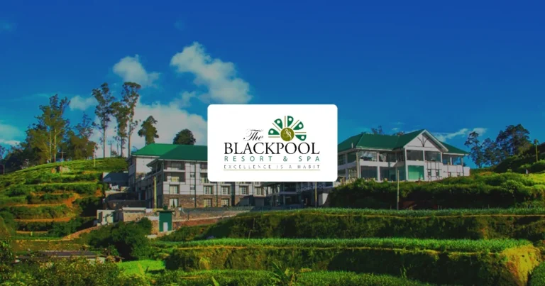 Blackpool Hotel surrounded by green gardens with the hotel branding