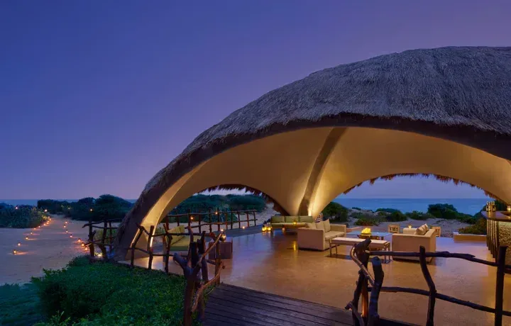 Thatched beachfront restaurant and terrace at Uga Chena Huts.