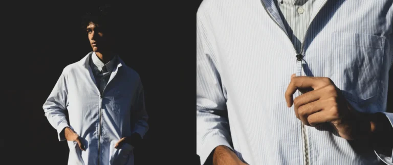 Hameedia menswear campaign showing a model wearing a light blue zip-front jacket