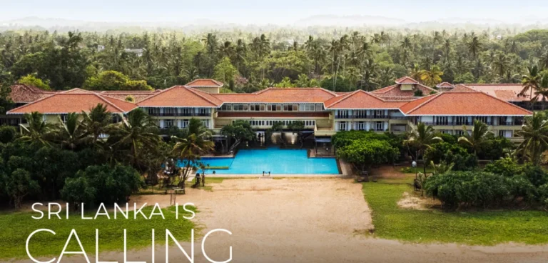 Heritance Ahungalla hotel and pool beside the beach, surrounded by palms